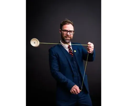 John Higby performs a yo-yo trick.