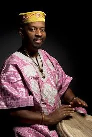 Drummer Kazi Oliver plays a drum. 